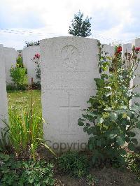 Dochy Farm New British Cemetery - Travers, L